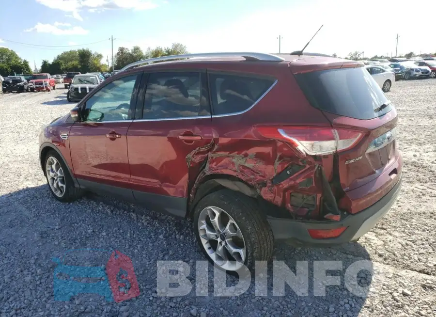 1FMCU0JX9GUB97438 Photo# 2