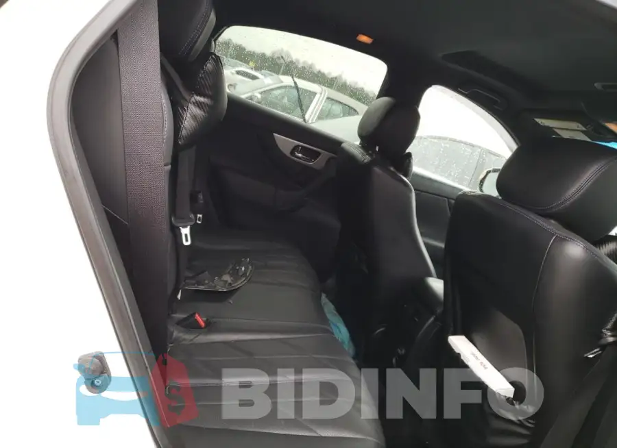 JN8CS1MW4GM751198 Photo# 11