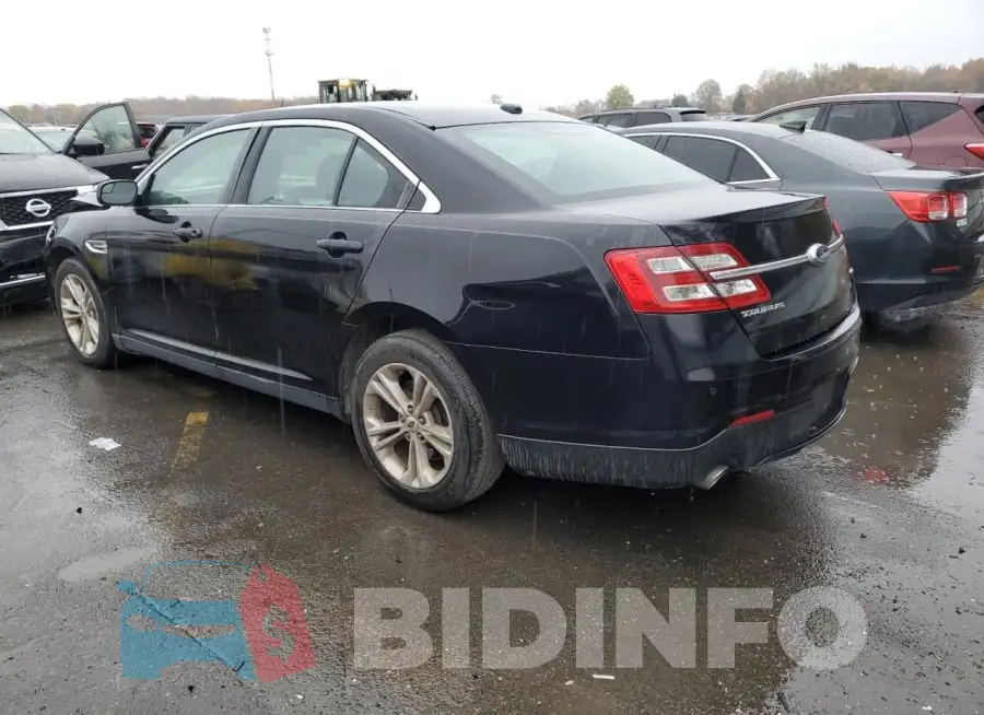 1FAHP2E85JG124711 Photo# 2