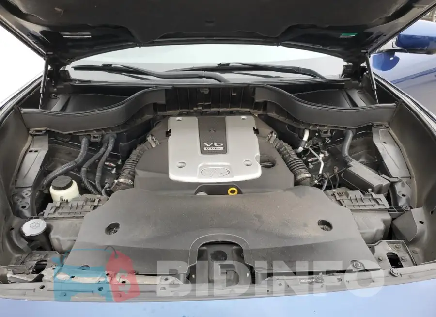 JN8CS1MUXFM380495 Photo# 11