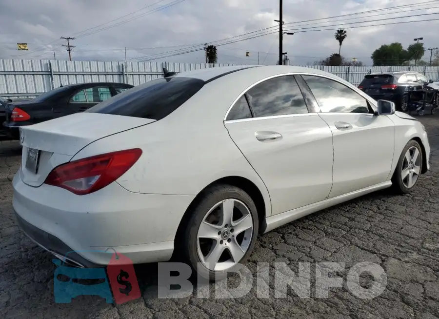 WDDSJ4EB2JN607907 Photo# 3