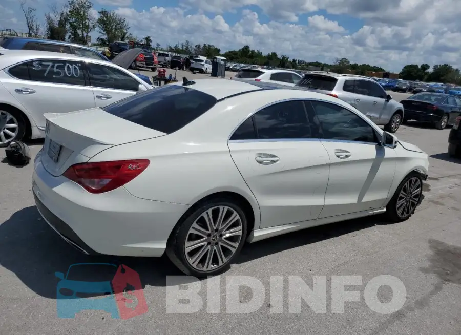 WDDSJ4EB2JN548180 Photo# 3