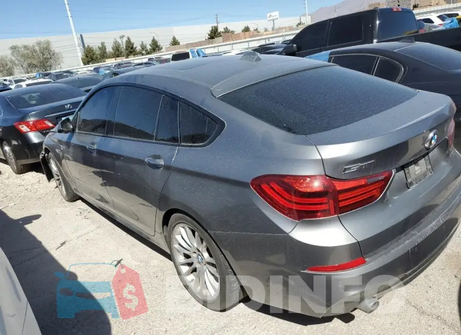 WBA5M2C51GGH99348 Photo# 2