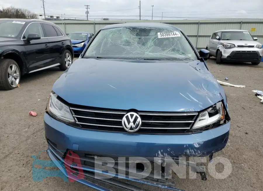 3VW2B7AJ2HM328318 Photo# 5
