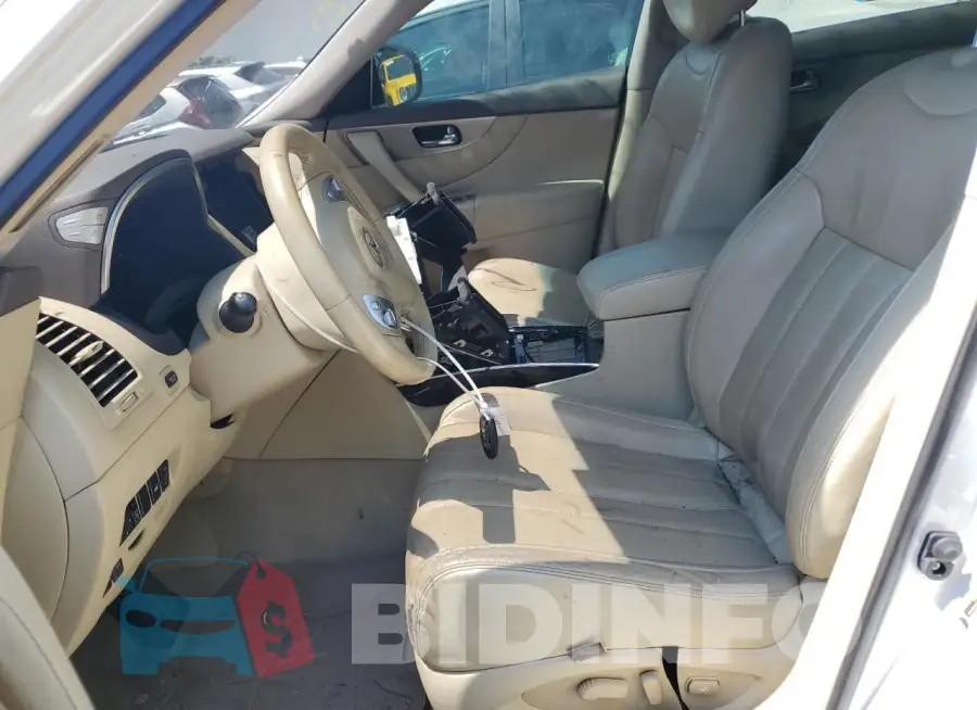 JN8CS1MU8HM142762 Photo# 7