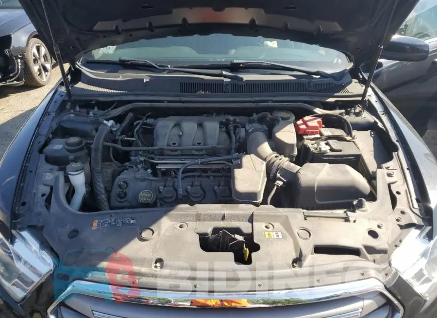 1FAHP2E82FG165059 Photo# 11