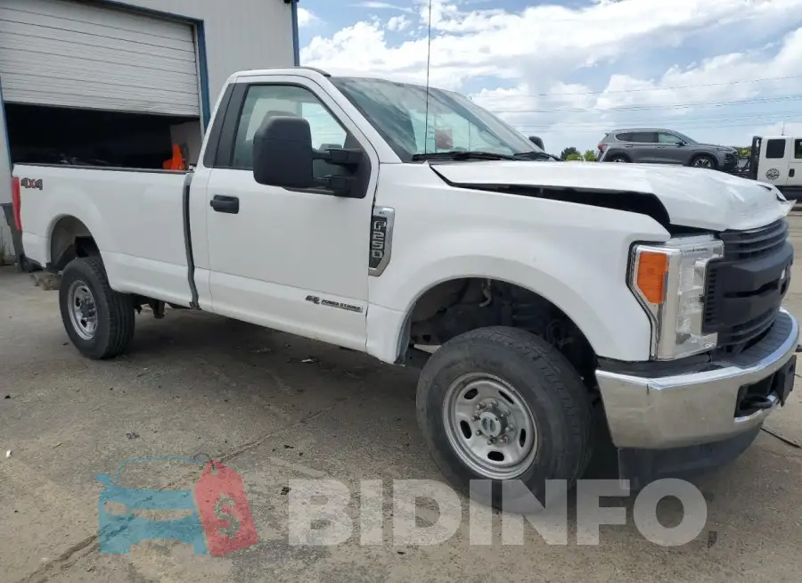 1FTBF2BT9HEC79828 Photo# 4