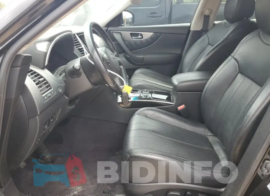 JN8CS1MWXHM412821 Photo# 7