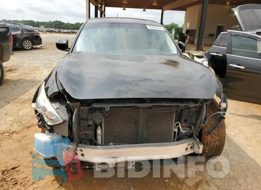 JN8CS1MWXHM412821 Photo# 5