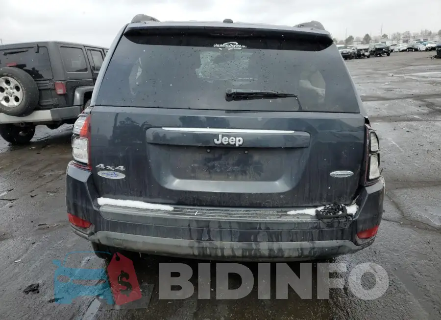 1C4NJDEB2GD579418 Photo# 6