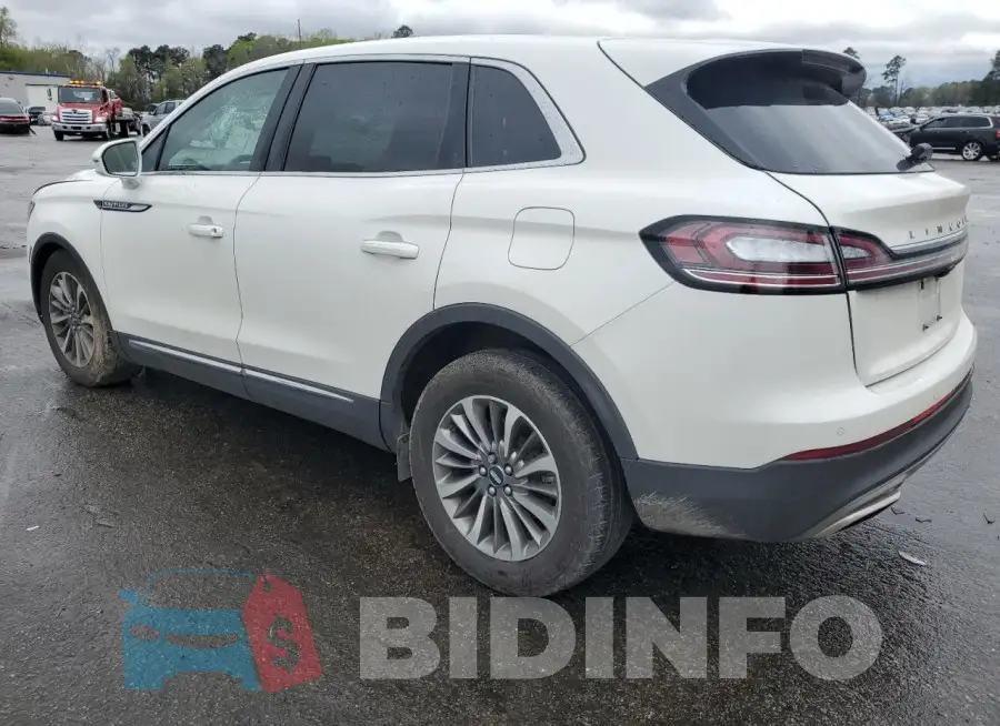 2LMPJ6J95MBL11259 Photo# 2