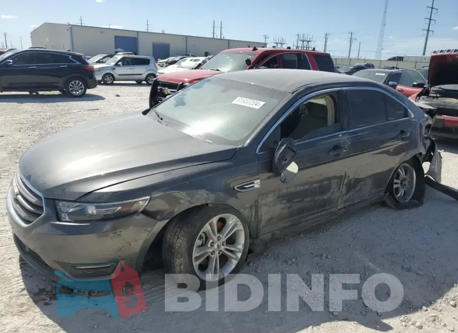 1FAHP2E81GG100785 Photo# 1
