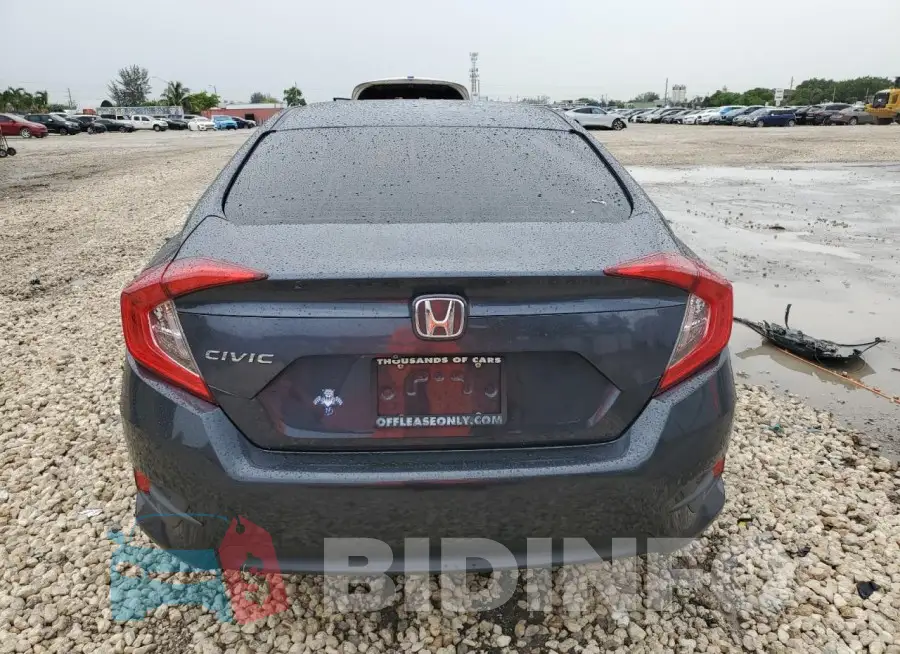 19XFC2F52JE044395 Photo# 6
