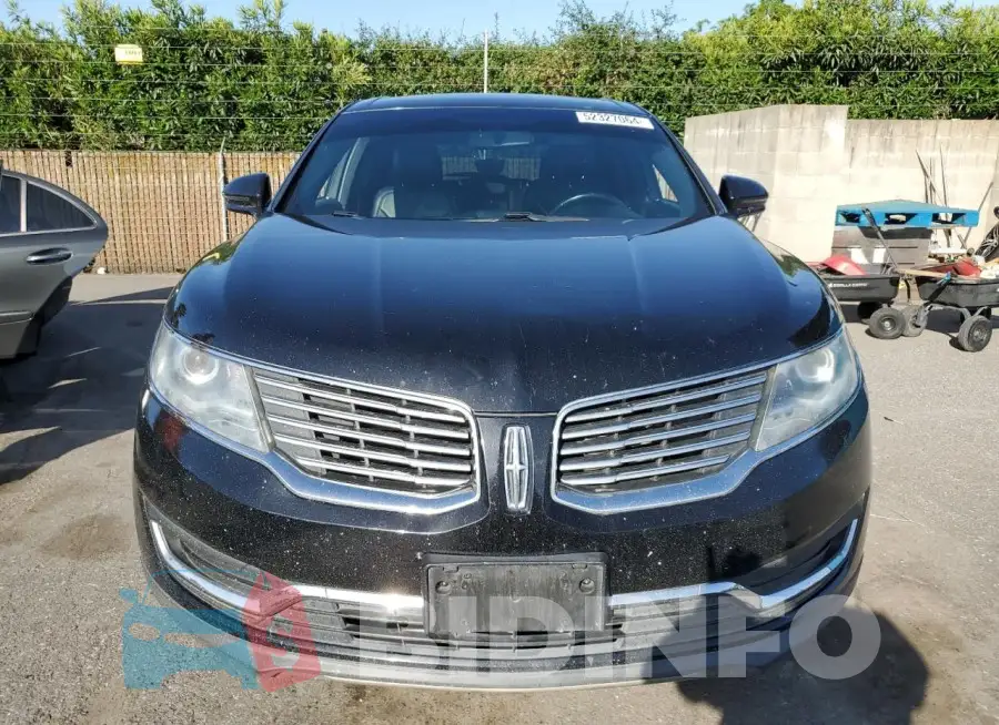 2LMTJ6KR9GBL79310 Photo# 5