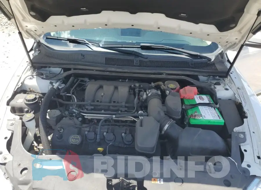 1FAHP2E8XGG121585 Photo# 11