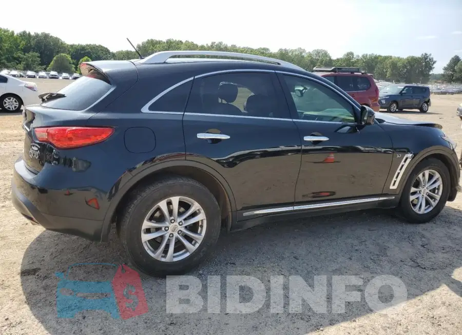 JN8CS1MU3FM381309 Photo# 3