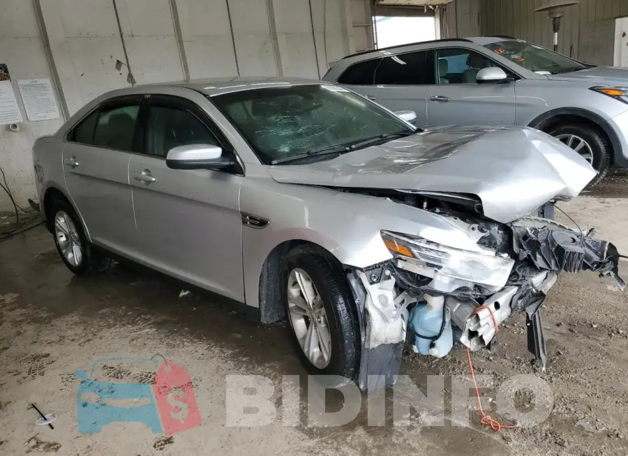 1FAHP2E82FG182492 Photo# 4