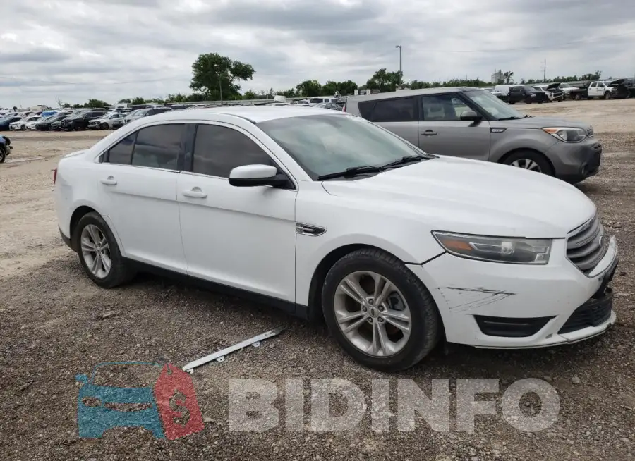 1FAHP2E96FG142358 Photo# 4