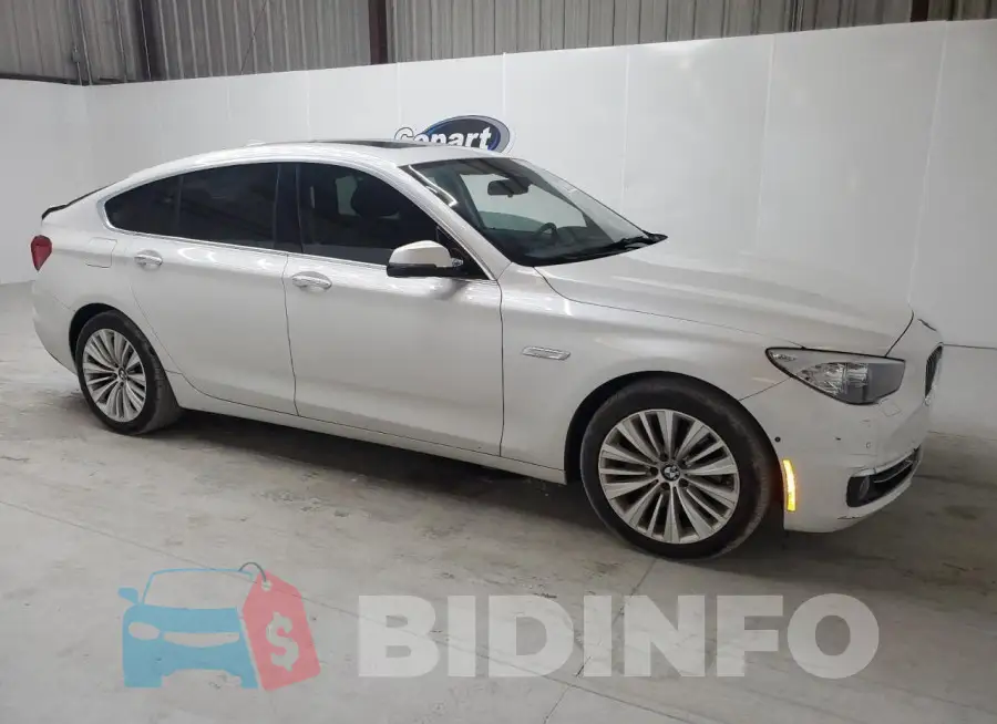 WBA5M2C57GGH99418 Photo# 4