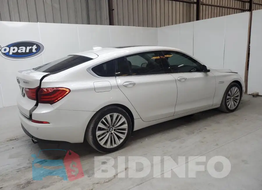 WBA5M2C57GGH99418 Photo# 3