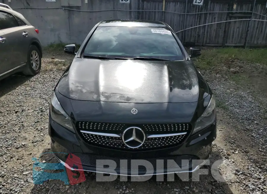 WDDSJ4EB9JN589891 Photo# 5