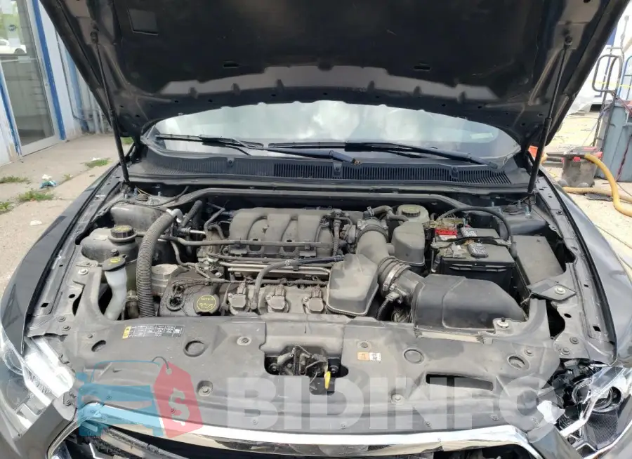 1FAHP2E8XFG174544 Photo# 11