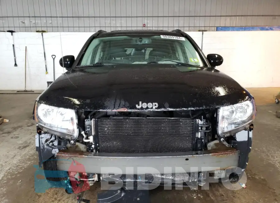 1C4NJDEB7GD663590 Photo# 5