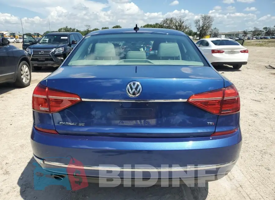 1VWBS7A31GC028593 Photo# 6