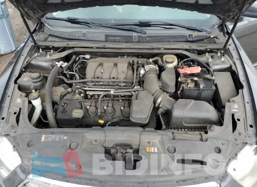 1FAHP2E8XFG181221 Photo# 11