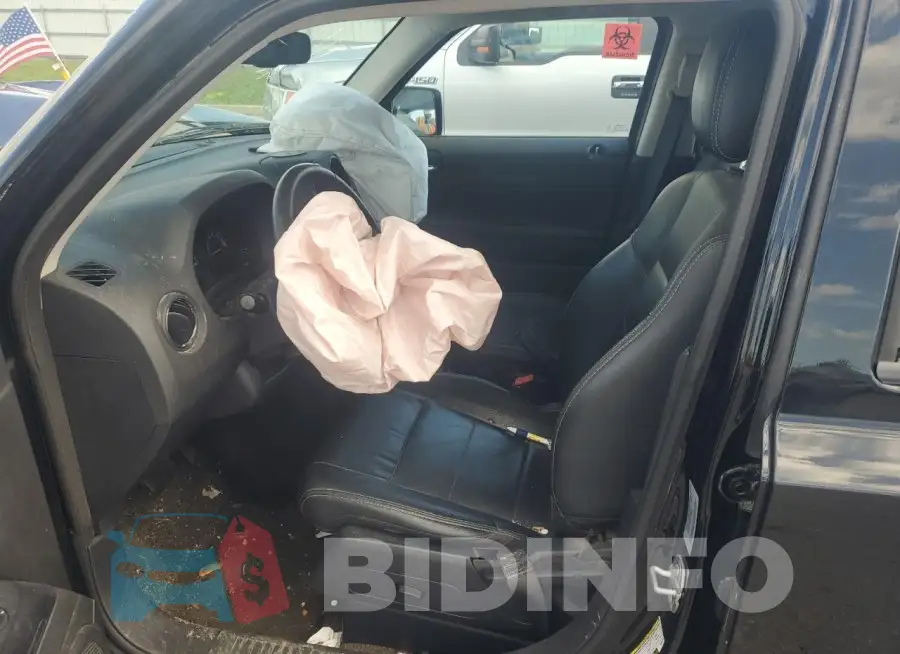 1C4NJRFB9GD697302 Photo# 7