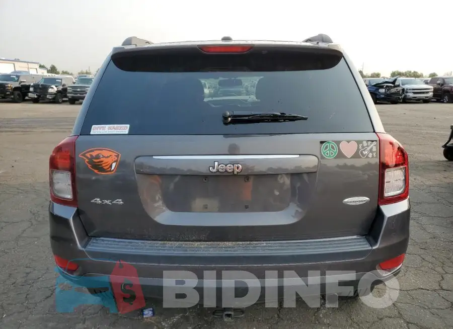 1C4NJDEB1GD724299 Photo# 6