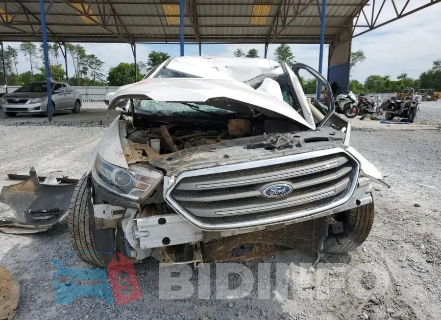 1FAHP2E83JG110919 Photo# 5