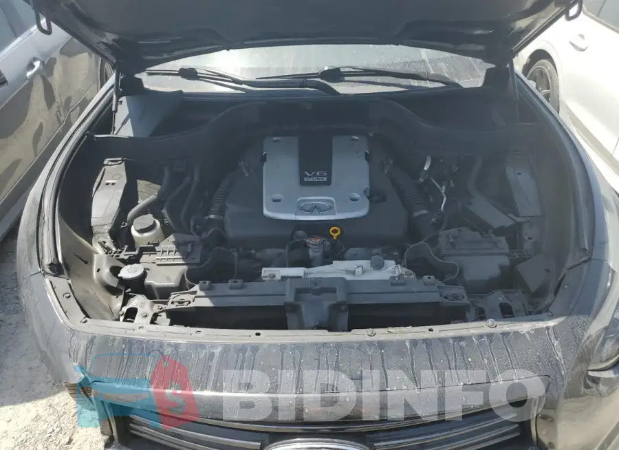 JN8CS1MU1FM380417 Photo# 12