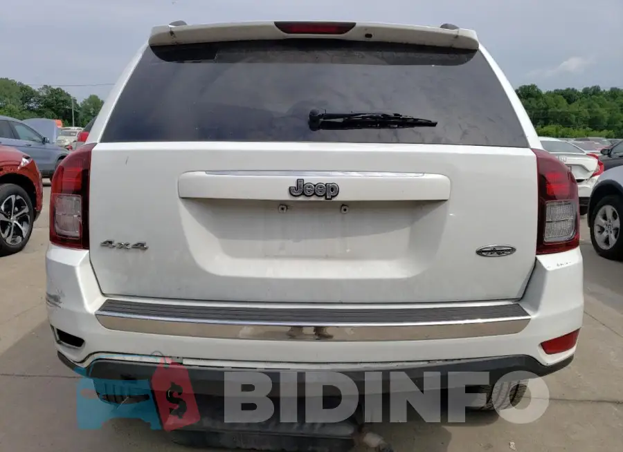 1C4NJDEB0GD673118 Photo# 6