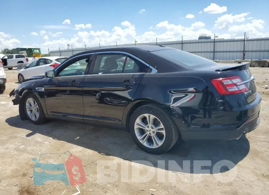 1FAHP2E82GG129213 Photo# 2