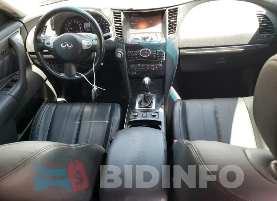 JN8CS1MUXFM382103 Photo# 8