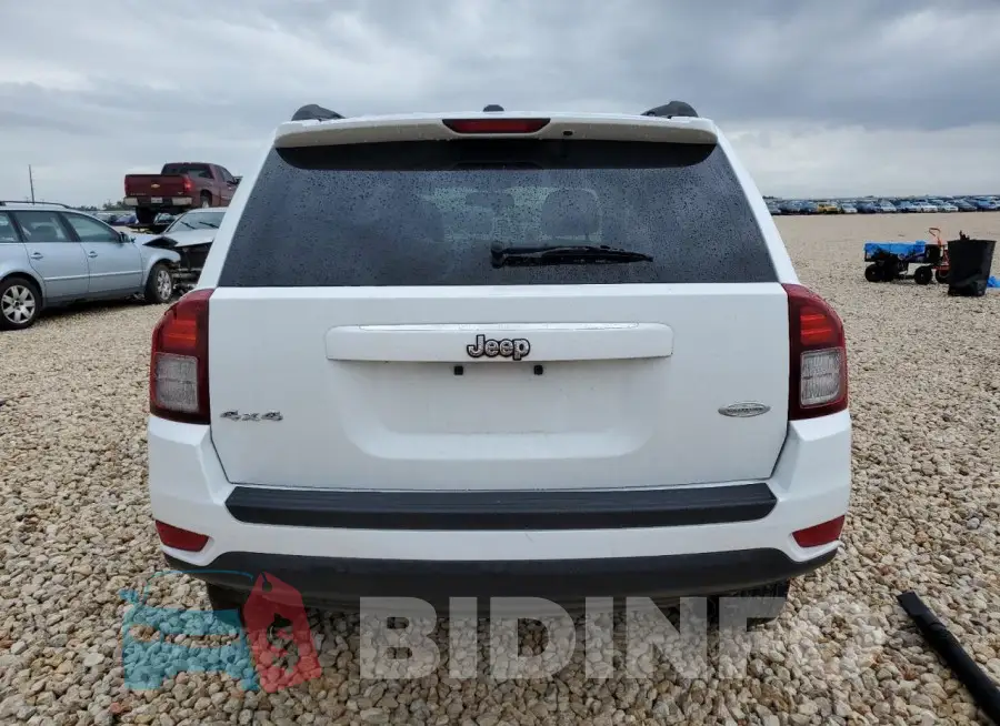 1C4NJDEB4GD637819 Photo# 6
