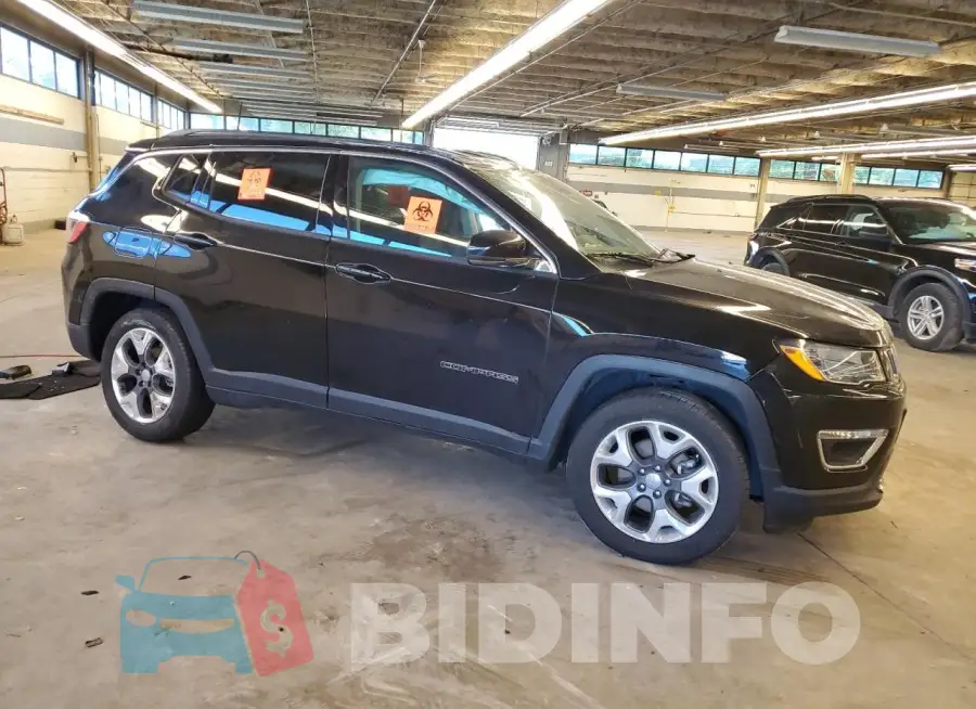 3C4NJDCB2KT854775 Photo# 4