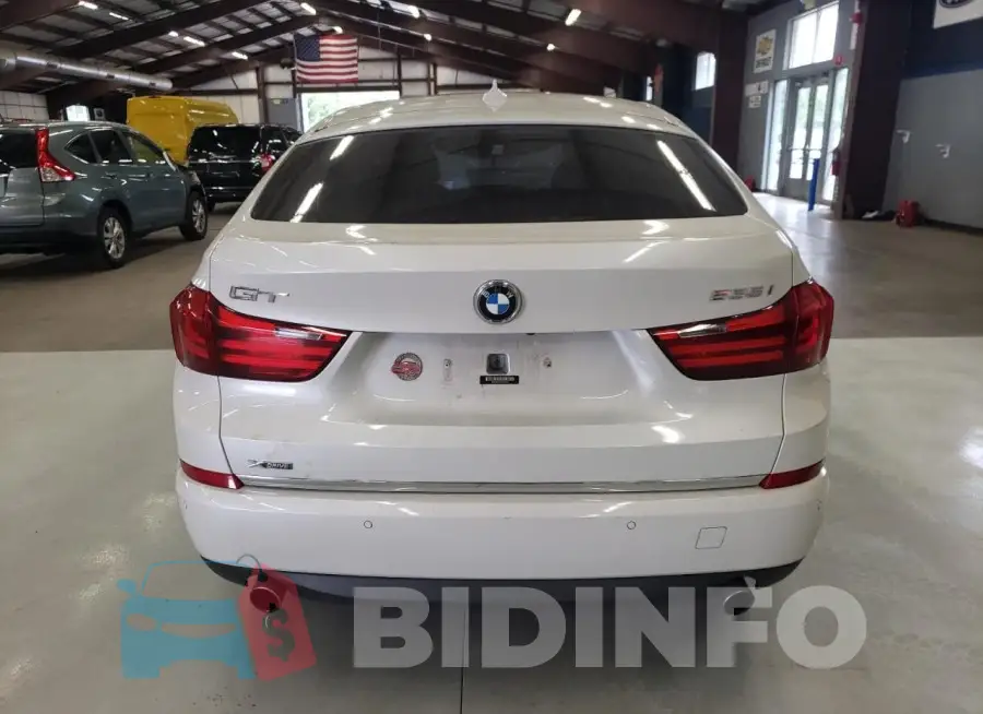 WBA5M4C33HD187159 Photo# 6