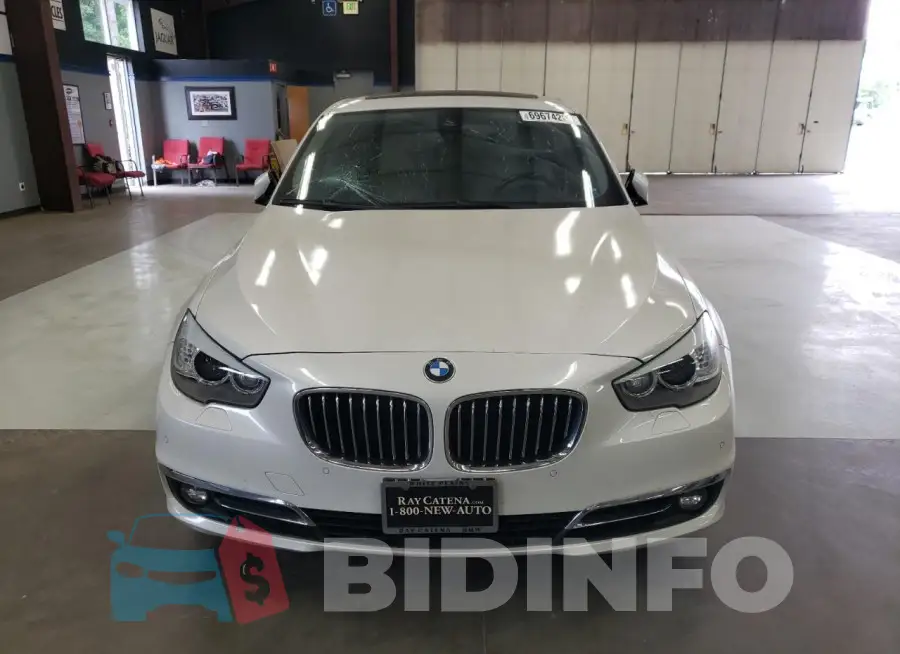 WBA5M4C33HD187159 Photo# 5