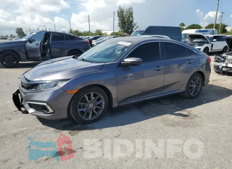 19XFC1F30ME001087 Photo# 1