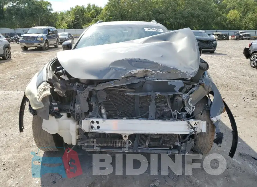 JN8CS1MUXGM671483 Photo# 5