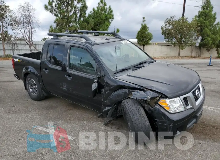 1N6ED0EB9LN702438 Photo# 4