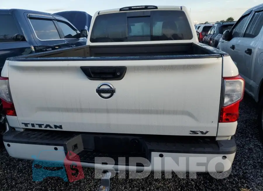 1N6AA1E61JN513232 Photo# 6
