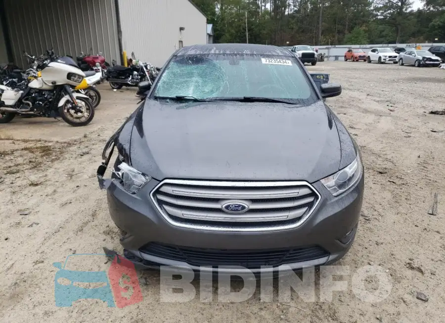 1FAHP2E8XGG125782 Photo# 5
