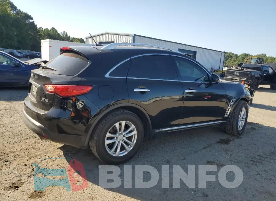 JN8CS1MWXFM482607 Photo# 3