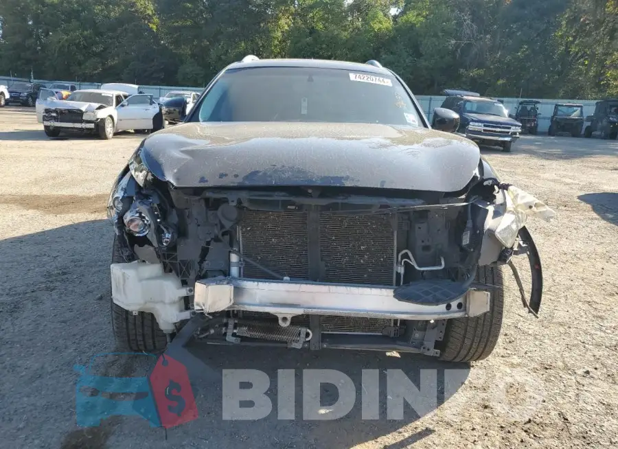 JN8CS1MWXFM482607 Photo# 5