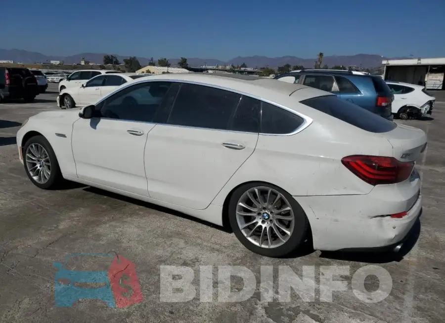 WBA5M2C52GG499072 Photo# 2