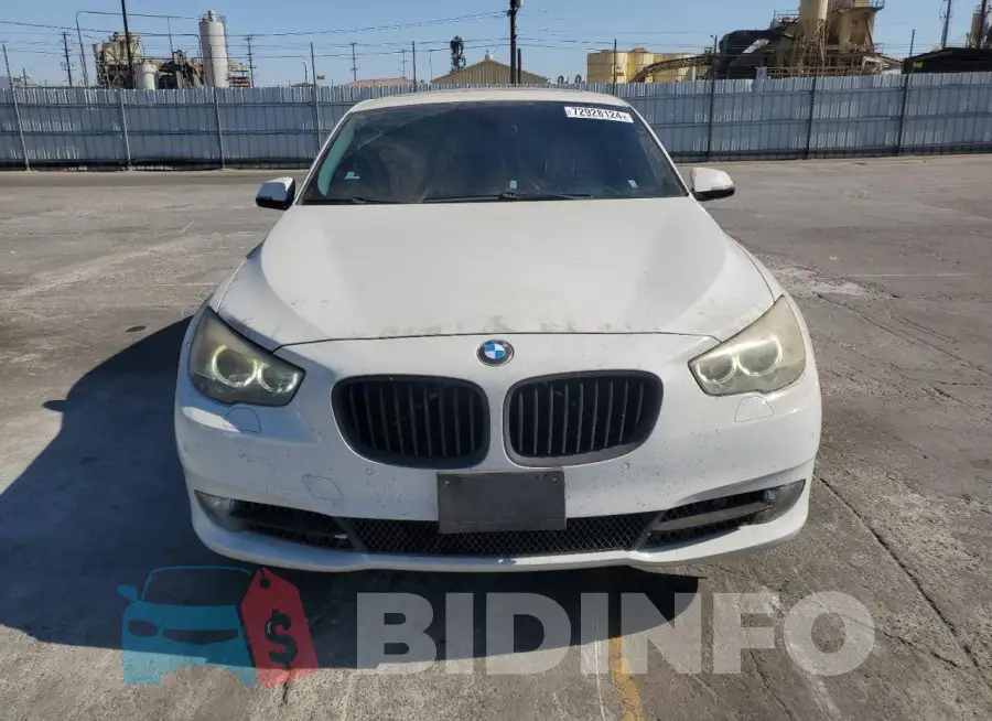 WBA5M2C52GG499072 Photo# 5