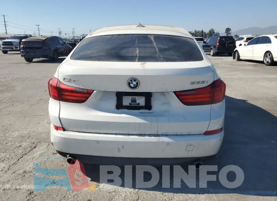WBA5M2C52GG499072 Photo# 6